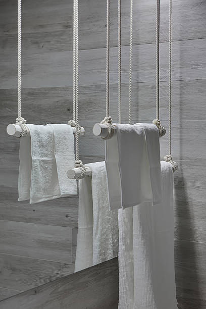 istock White wooden towel holders 629267632