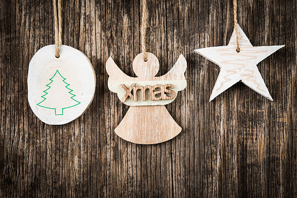 istock Christmas decorations on rustic wooden background 629267750