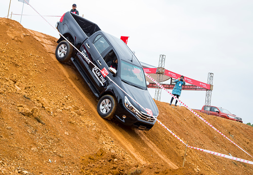 Hanoi, Vietnam - Nov 26, 2016: Toyota Hilux 2016 all new car is running on the test offroad in Vietnam.