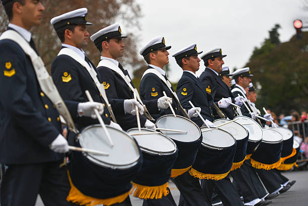 Buenos Aires, Argentina - May 11, 2018: Group of soldiers of the Patrician Regiment of Buenos Aires walk marching through the streets after the change of guard in the monument to the fallen in the Malvinas War (Falklands War)