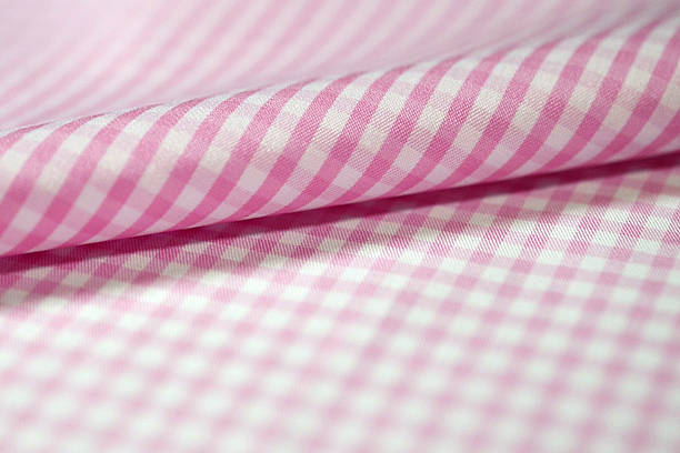istock close up roll stripe pink fabric of shirt 629285170