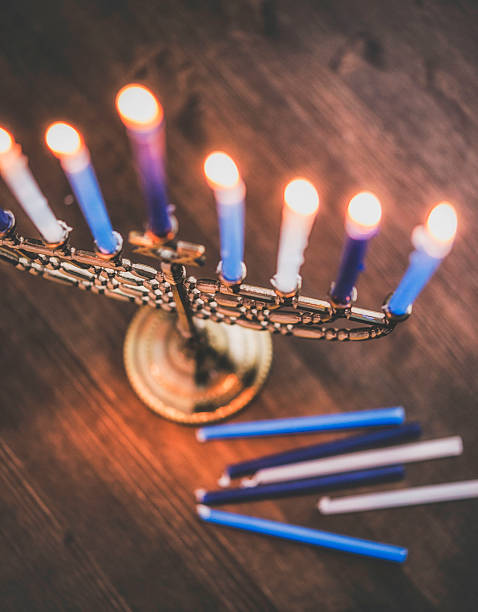 Menorah with burning candles. Hanukkah preparations