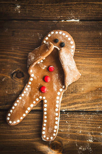 istock Sad little gingerbread man covering his face 629292262