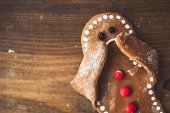 Sad little gingerbread man covering his face