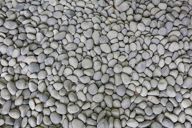 kerikil abu-abu lanskap rocks - kerikil batu potret stok, foto, & gambar bebas royalti