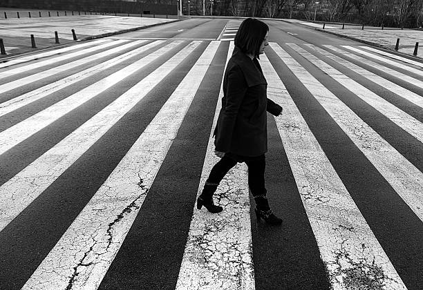 istock Woman in zebra crossing 629292466