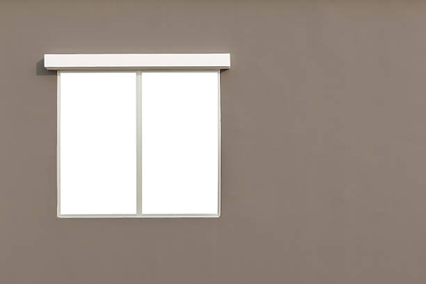 istock Window isolated on white with brown wall background 629292504