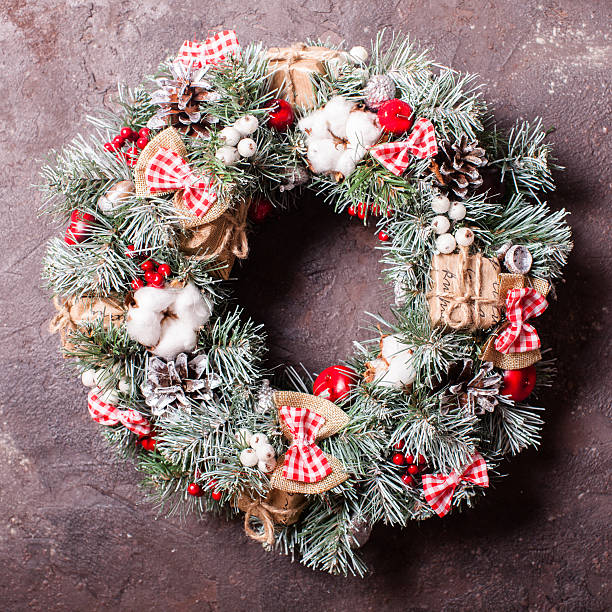 istock Red and white Christmas wreath 629294406