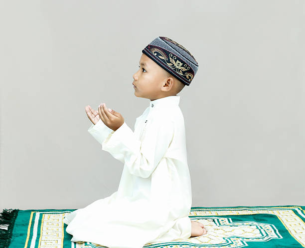 Muslim Movements While Praying Stock Photo - Download Image Now - Child,  Praying, Islam - iStock