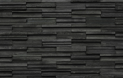 Ladrillos negros de color pizarra textura fondo, piedra de pizarra textura de la pared photo