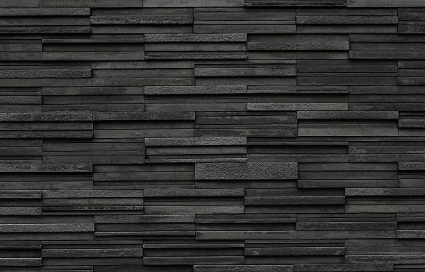 ladrillos negros de color pizarra textura fondo, piedra de pizarra textura de la pared - pared de piedra fotografías e imágenes de stock