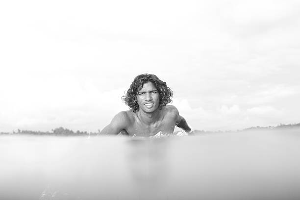 local island surfer in the water - male beauty imagens e fotografias de stock