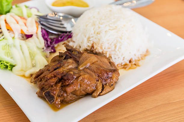 istock Roasted chicken with rice and vegetable salad. 629305576