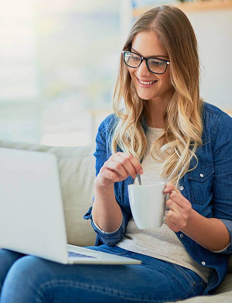 istock Connected to the world with a coffee in hand 629305640