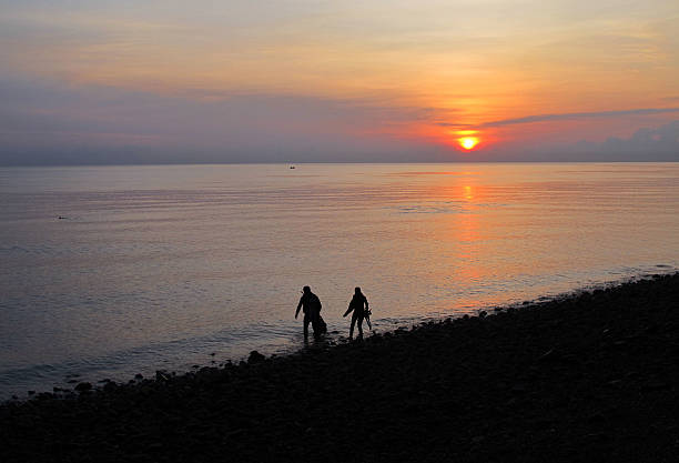 istock Scuba Divers at Sunrise, Tulamben 629305660