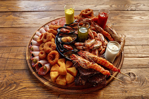 istock Seafood platter on wooden table background 629306188