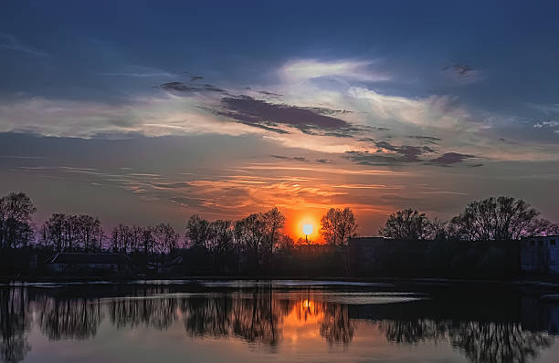 istock Setting Sun Over The Lake 629321276