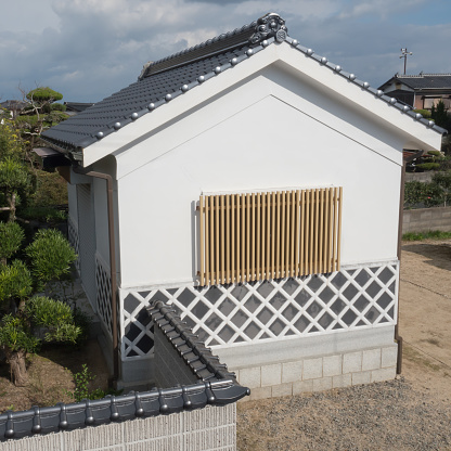 A Japanese traditional warehouse with white wall.