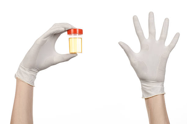 istock Medical theme: doctor's hand in white gloves holding a transpare 629323614