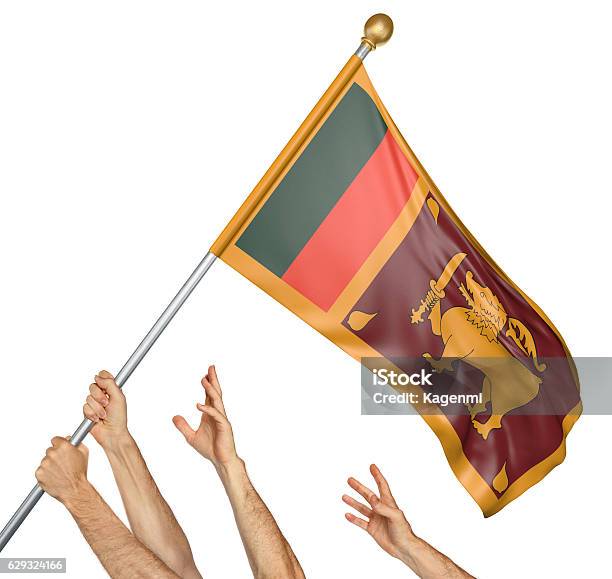 Team Of Peoples Hands Raising The Sri Lanka National Flag Stock Photo - Download Image Now