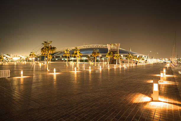 Khalifa stadium in Doha Doha, Qatar - November 28, 2016: Night view of the Khalifa Olimpic Stadium. The stadium will be one of the official field for the next 2022 world cup and it is located at the west of downtown doha. qatar stock pictures, royalty-free photos & images