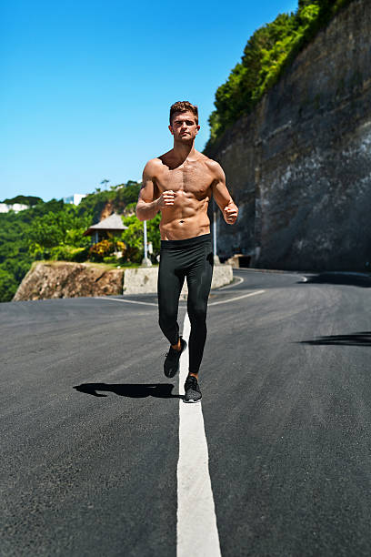 istock Handsome Muscular Man Running And Exercising Outdoors. Sport, Fi 629339776