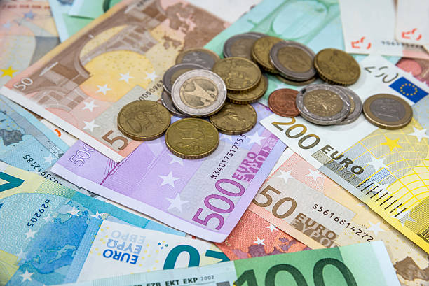 istock euro money - background with banknotes and coins 629341314