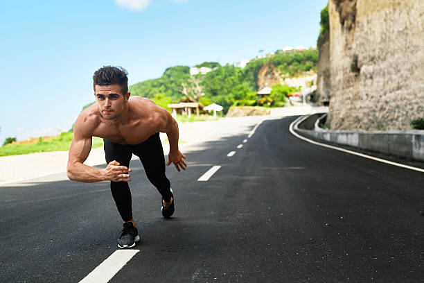 istock Athletic Man Ready To Start Running Outdoors. Sports Workout Con 629341398