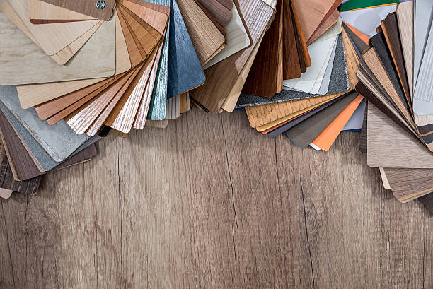 istock Plastic and wood sample color  on light desk. 629342502