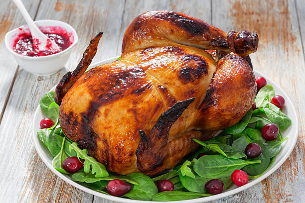 istock whole chicken roasted in oven on white plate with salad 629342900