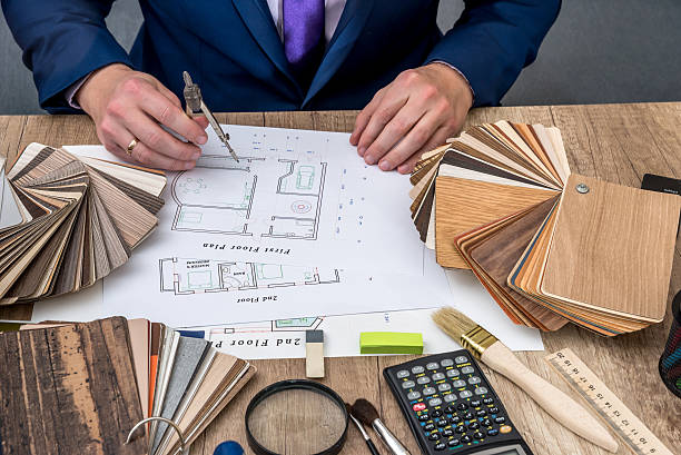 designer working with architect sketching construction project on wooden table - social housing audio imagens e fotografias de stock