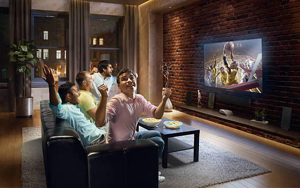 istock Students watching Basketball game at home 629343492