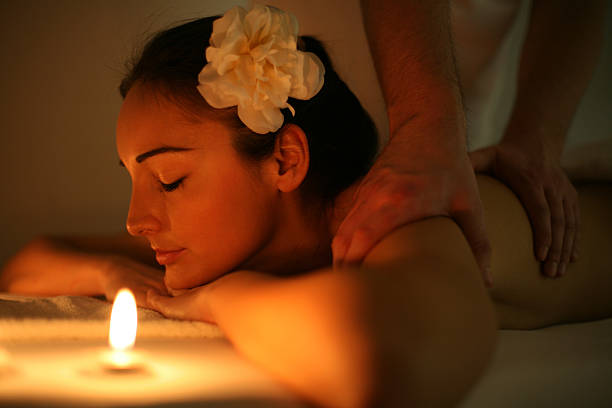 istock Woman enjoying a massage treatment. 629344006