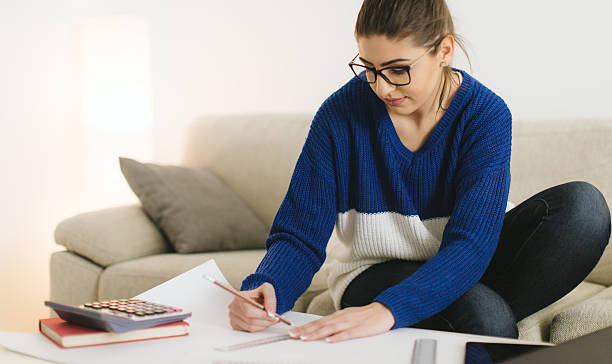 istock Woman working on finances 629354058