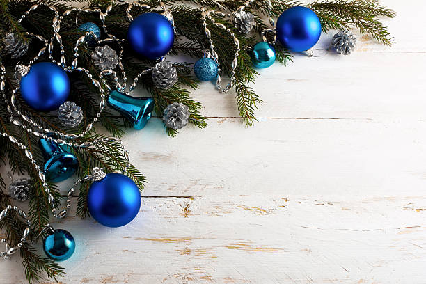 istock Christmas background with silver pinecone and blue ornaments 629356206