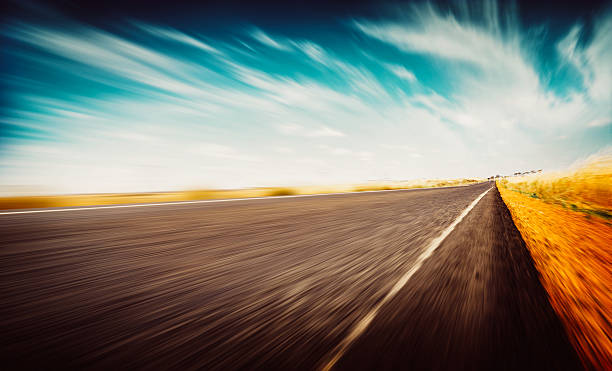 istock Sport car fast speed driving on the apshalt road 629356708