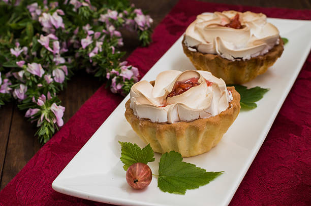 istock Cake with meringue and pumpkin  apple jam on the background 629359246
