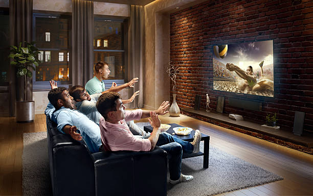 istock Students watching very realistic Volleyball game on TV 629366810