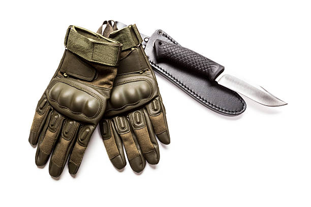 istock military knife and gloves isolated 629366864