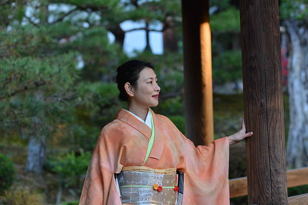 Japanese woman in kimono at Tofuku-ji Temple stock photo