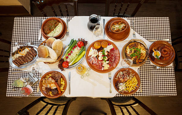 Directly above shoot of table with served food in restaurant