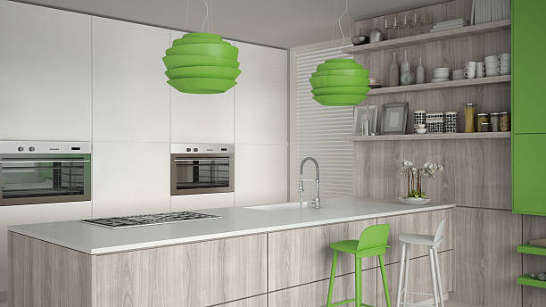 istock Minimalistic white kitchen with wooden and green details, minima 629375238