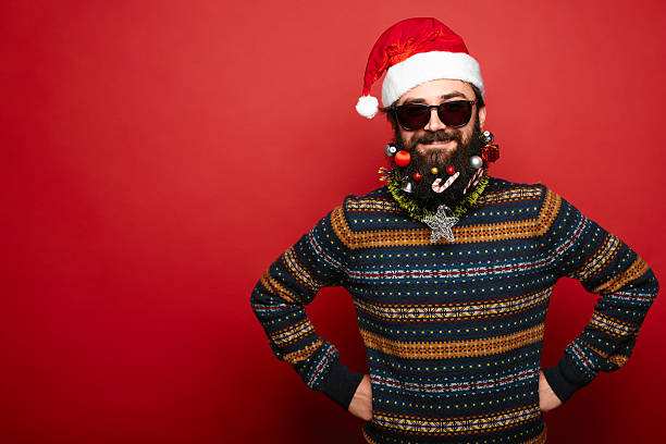 istock man in Santa Claus hat and sunglasses 629376680