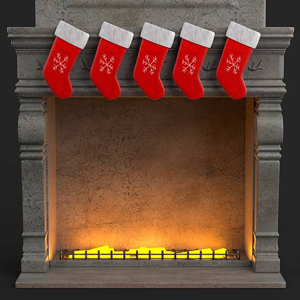 istock christmas socks on fireplace 629387116