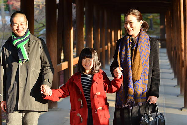 japanese family walking at Tofuku-ji Temple, Kyoto stock photo