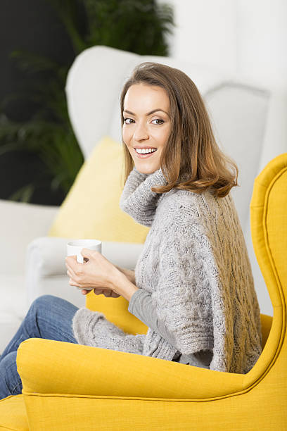 istock Young woman enjoying coffee 629388350
