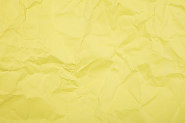 istock Yellow crumpled paper texture 629388786