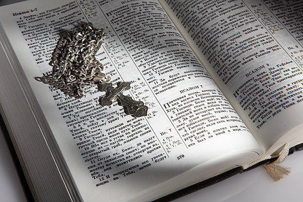 istock Bible and next-to-skin orthodox cross 629405690