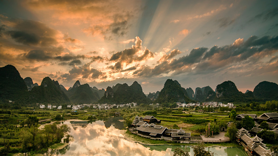 Sun rise on karst mountains and river Li in Guilin/Guangxi region of China