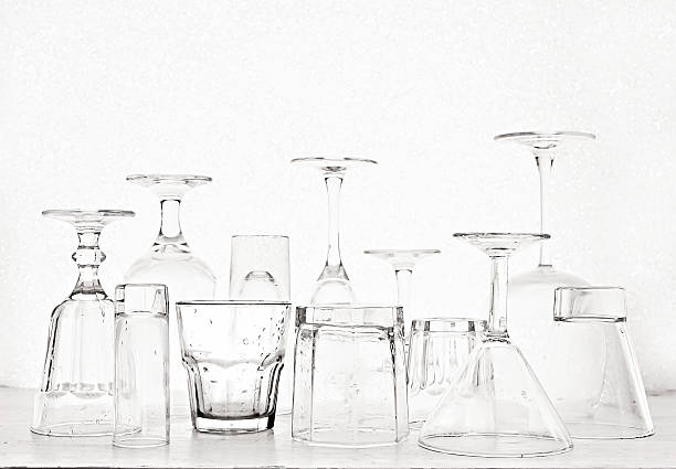 istock Glass goblets of different shapes on a white background 629405838